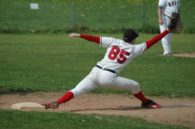 Mike Cresswell stretches to make a catch for the Herts Hawks.